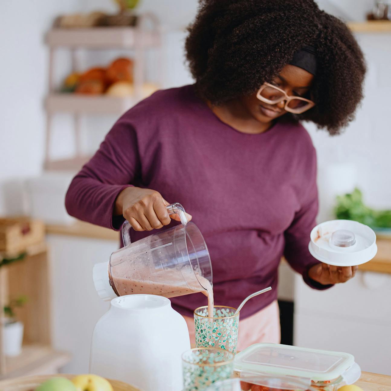 Woman preparing a healthy drink after bariatric surgery