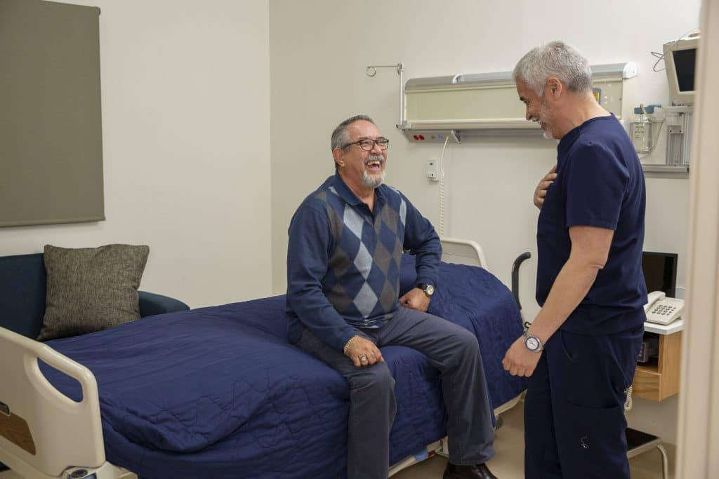 Dr. Ortiz consulting with a weight loss patient in Tijuana, MX